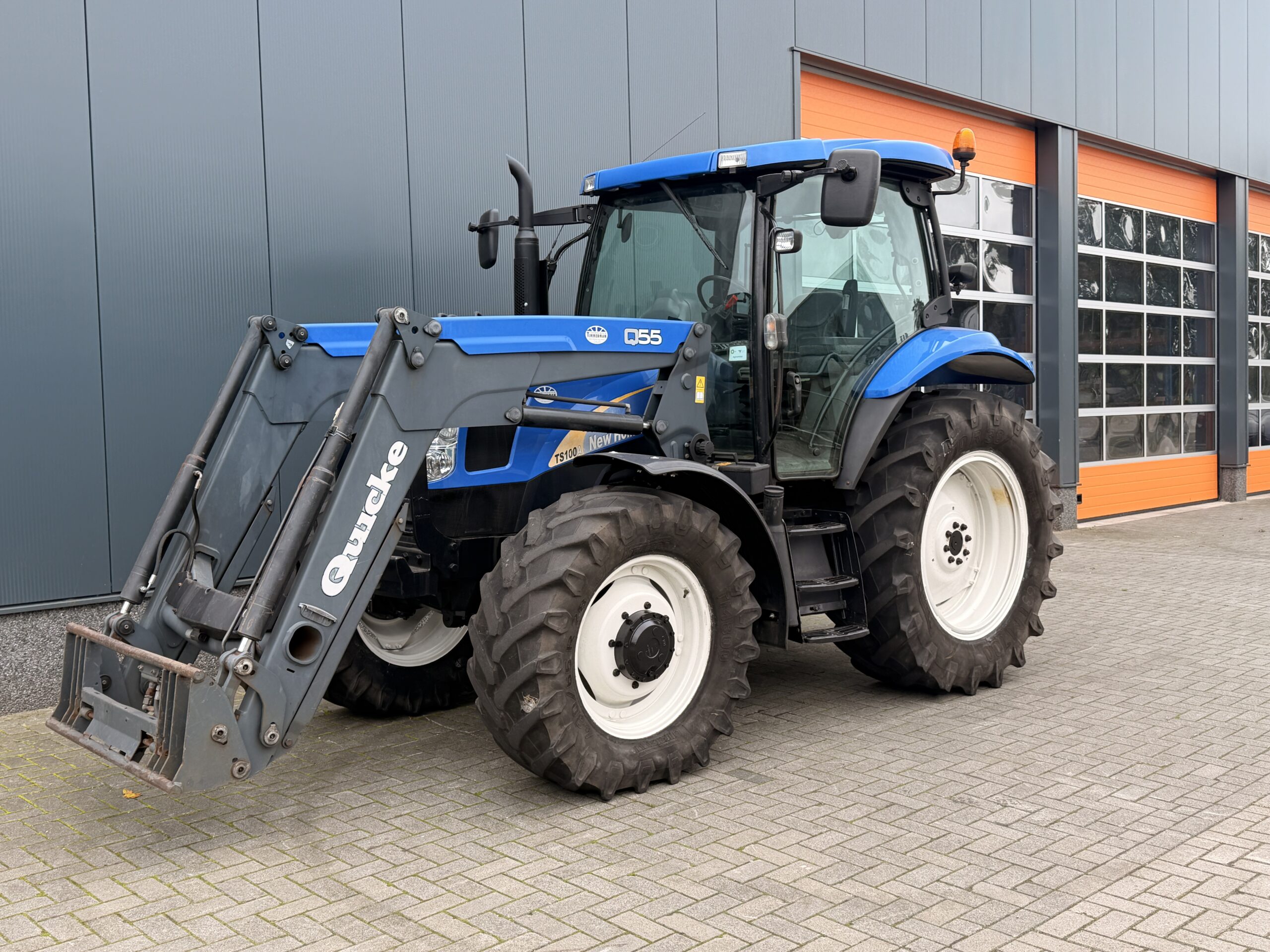 New Holland TS100 met Quicke Q55 voorlader - Afbeelding 11