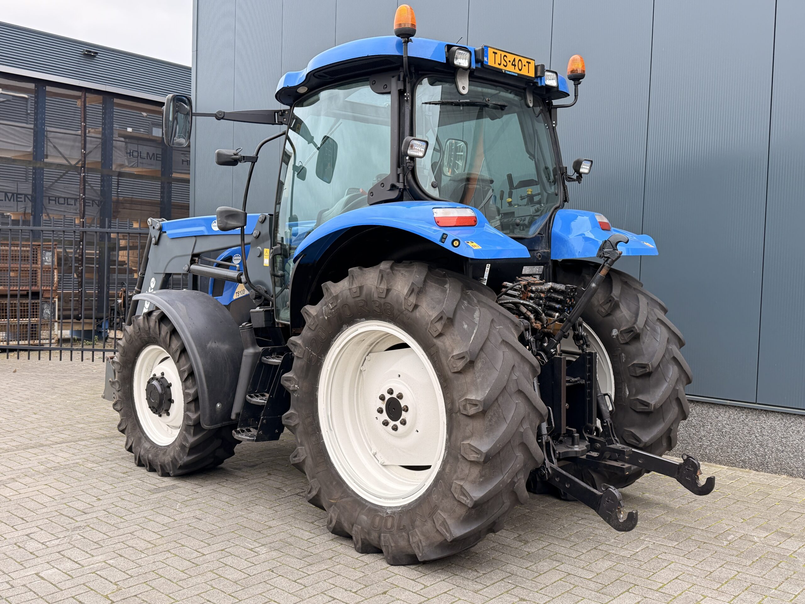 New Holland TS100 met Quicke Q55 voorlader - Afbeelding 10
