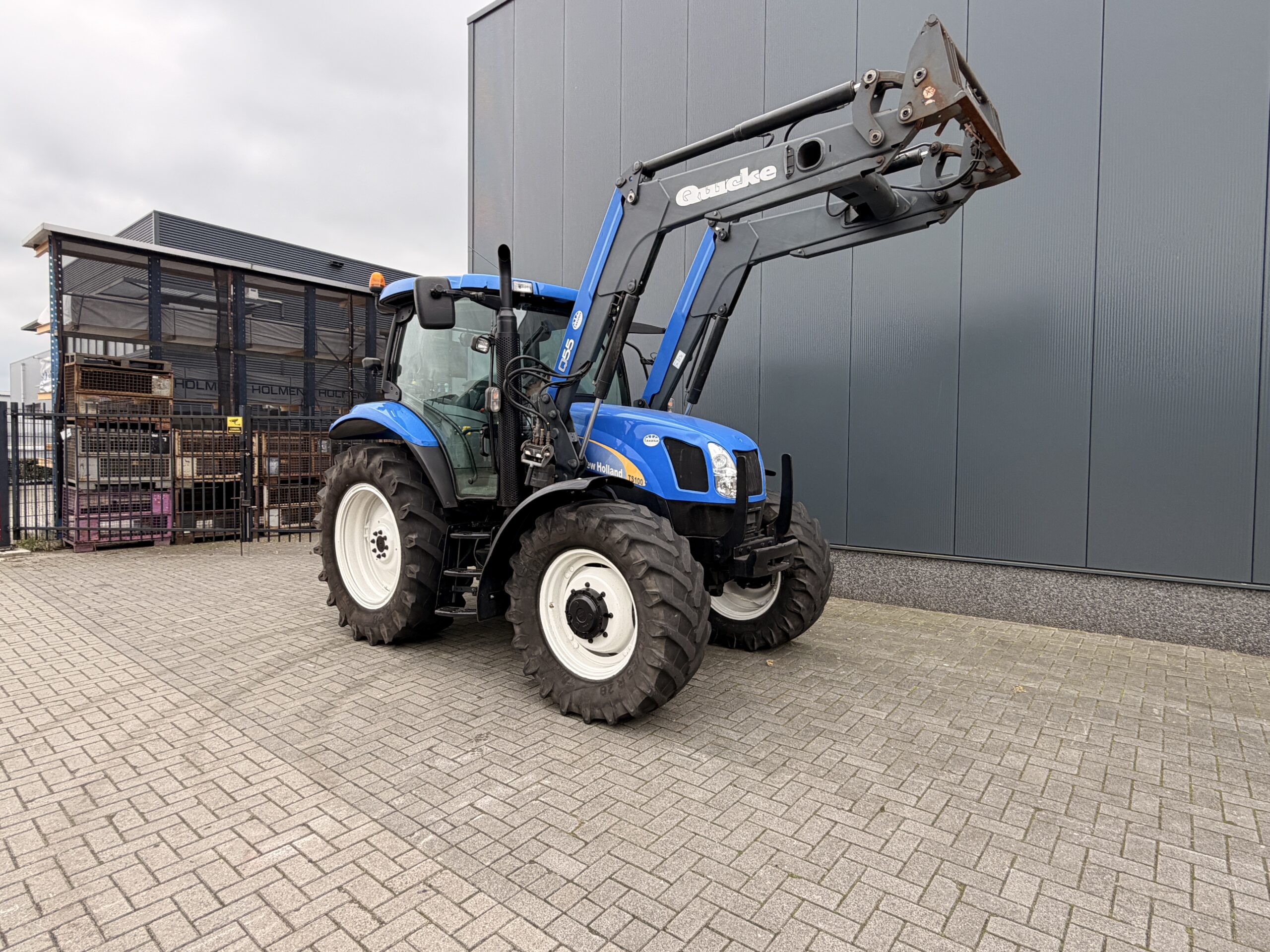 New Holland TS100 met Quicke Q55 voorlader - Afbeelding 6