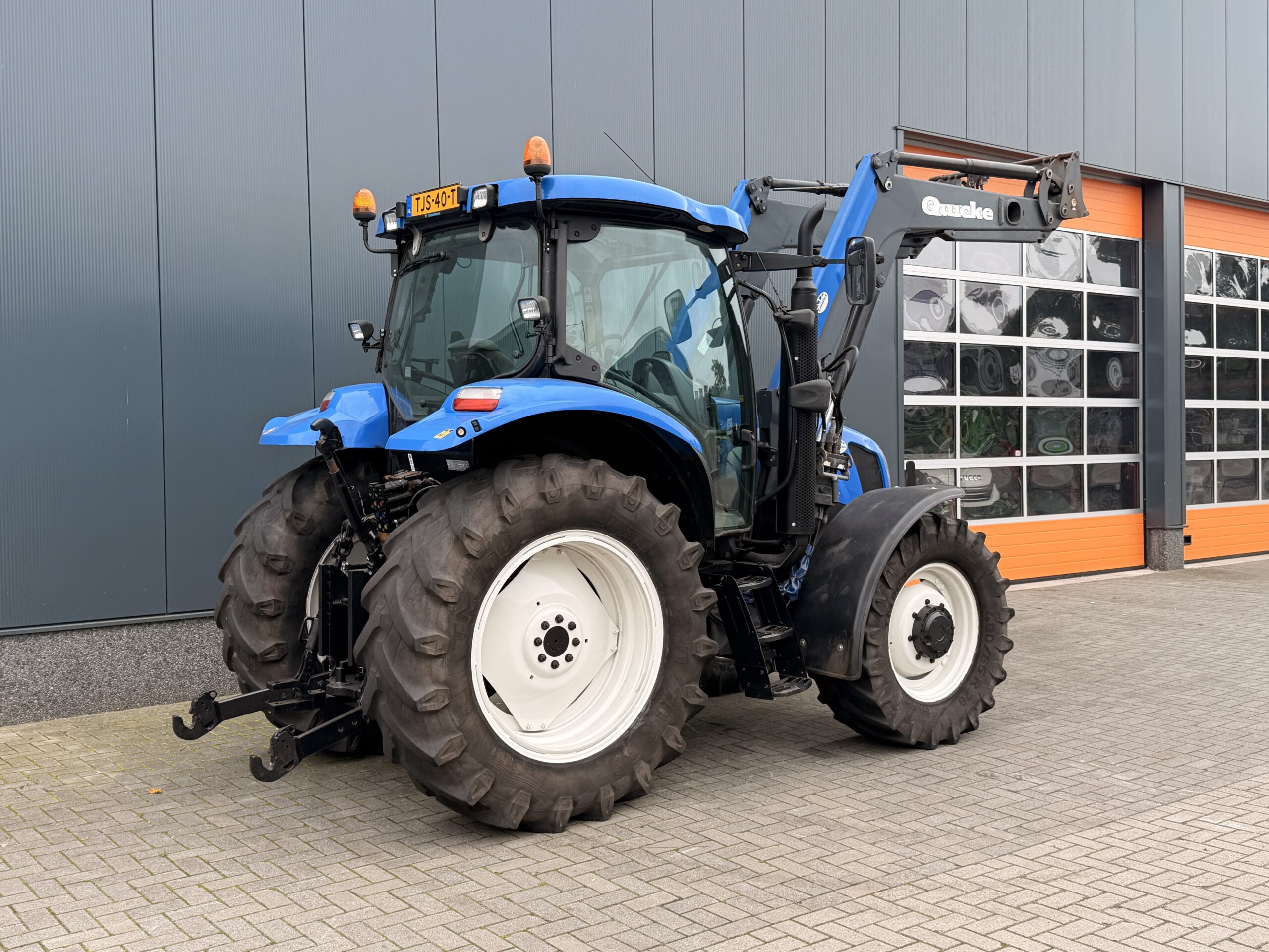 New Holland TS100 met Quicke Q55 voorlader - Afbeelding 4